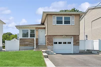 83 Scarcliffe Drive, Malverne, NY 11565 - Photo 1