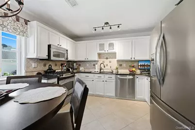 129 Farm House Court #129, Manorville, NY 11949 - Photo 7