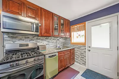 12135 Milburn Street, Springfield Gardens, NY 11413 - Photo 9