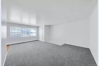 1005 Towne House Village, Islandia, NY 11749 - Photo 3