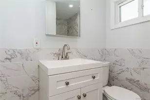 112 Woods Ave, Roosevelt, NY 11575 - Photo 11