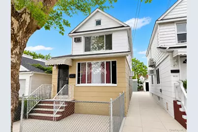 10713 Sutter Avenue, Ozone Park, NY 11417 - Photo 1