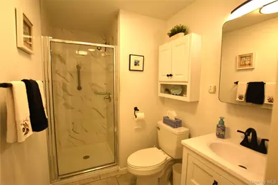 105 W Village Circle #105, Manorville, NY 11949 - Photo 15