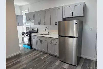 9111 31st Avenue, East Elmhurst, NY 11369 - Photo 1