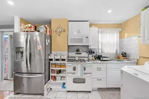94-46 214th Pl, Queens Village, NY 11428 - Photo 9