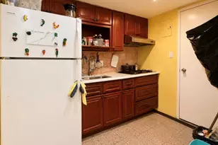 104-21 39th Ave, Corona, NY 11368 - Photo 5