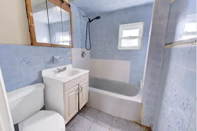 104 E Pennywood Avenue, Roosevelt, NY 11575 - Photo 13