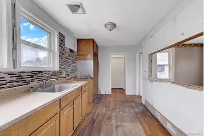 104 E Pennywood Avenue, Roosevelt, NY 11575 - Photo 11