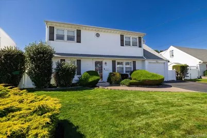 129 Arlyn Drive W, Massapequa, NY 11758 - Photo 1