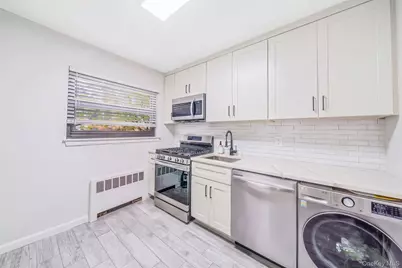 218-02 73rd Avenue #397A1, Oakland Gardens, NY 11364 - Photo 9
