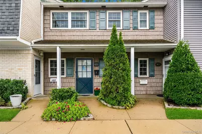1056 Village Drive #1056, Hauppauge, NY 11788 - Photo 1