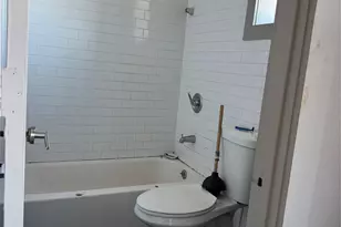96-02 Northern Blvd, Corona, NY 11356 - Photo 1