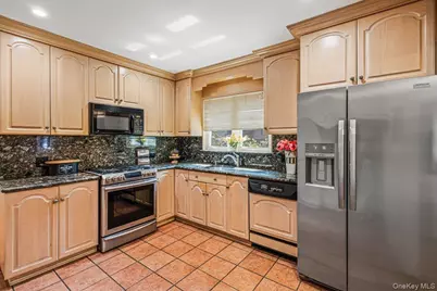 217-06 Stewart Road, Oakland Gardens, NY 11364 - Photo 13