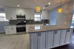 32-23 Plunkett Ave, Far Rockaway, NY 11691 - Photo 1
