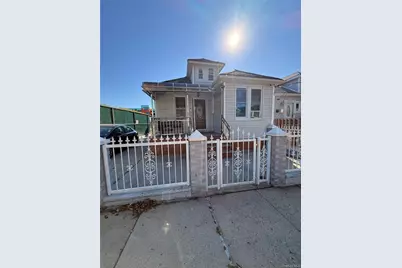 10716 Sutter Avenue, Ozone Park, NY 11417 - Photo 1