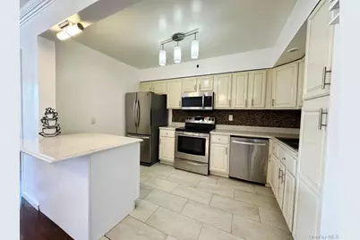 9417 83rd Street, Ozone Park, NY 11416 - Photo 1