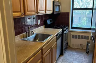 141-05 Pershing Crescent, Briarwood, NY 11435 - Photo 1