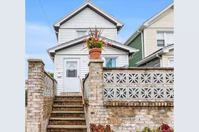 84-11 Sutter Avenue, Ozone Park, NY 11747 - Photo 1