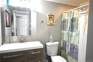 77 Village Cir W, Manorville, NY 11949 - Photo 9