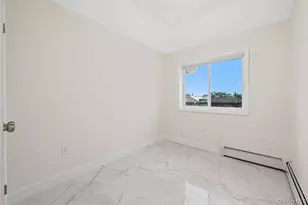 106-03 49th Ave, Corona, NY 11368 - Photo 9