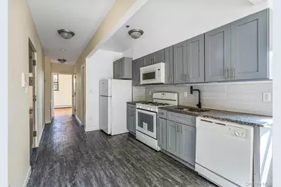 100-15 34th Avenue, Corona, NY 11368 - Photo 9