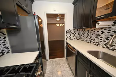 84-01 Main St #410, Briarwood, NY 11435 - Photo 21