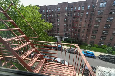 84-01 Main St #410, Briarwood, NY 11435 - Photo 29