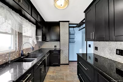 94 Woods Avenue, Roosevelt, NY 11575 - Photo 29