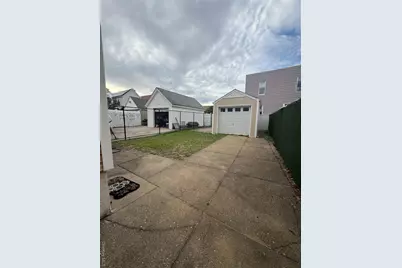 9515 Pitkin Avenue, Ozone Park, NY 11417 - Photo 23