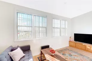 24-12 86th St, East Elmhurst, NY 11370 - Photo 1