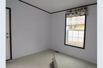 525 57 Riverleigh Avenue #57, Riverhead, NY 11901 - Photo 9