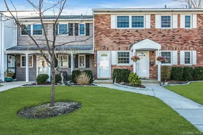 457 Village Drive #457, Hauppauge, NY 11788 - Photo 1