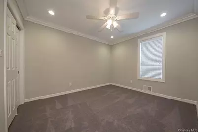 1 Villa D'Est Drive #E-09, Coram, NY 11727 - Photo 9