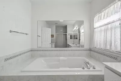 10 Sagaponack Court #10, Ridge, NY 11961 - Photo 19