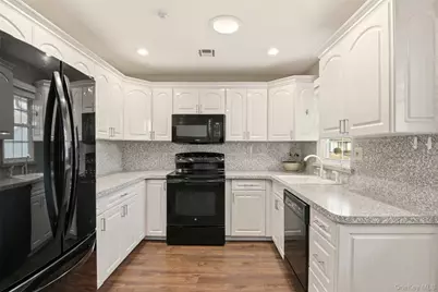 360 Woodbridge Drive #A, Ridge, NY 11961 - Photo 7