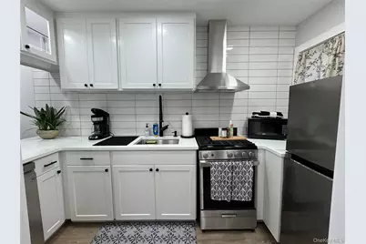 49 Canoe Place Road #312, Hampton Bays, NY 11946 - Photo 7