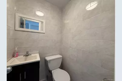 8617 Sutter Avenue, Ozone Park, NY 11417 - Photo 3