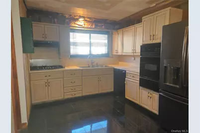 86 Decatur Street, Roosevelt, NY 11575 - Photo 13