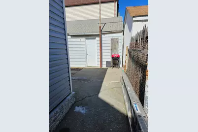 9417 Pitkin Avenue, Ozone Park, NY 11417 - Photo 21