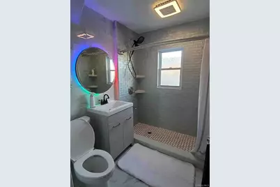 9417 Pitkin Avenue, Ozone Park, NY 11417 - Photo 13