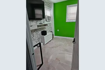 9417 Pitkin Avenue, Ozone Park, NY 11417 - Photo 9