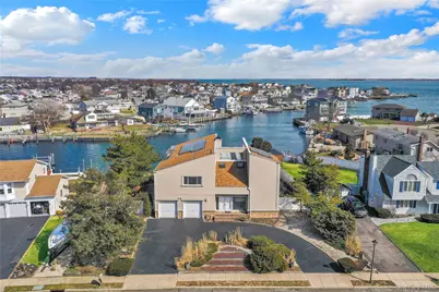49 Dolphin Lane E, Copiague, NY 11726 - Photo 1