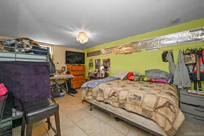 77-06 Kneeland Avenue, Elmhurst, NY 11373 - Photo 15