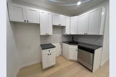 9307 69th Avenue, Forest Hills, NY 11375 - Photo 1