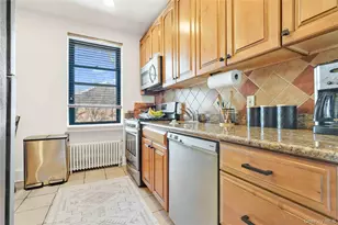 77-07 Ditmars Blvd, East Elmhurst, NY 11370 - Photo 9