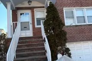 90-24 Spritz Rd, Ozone Park, NY 11417 - Photo 1