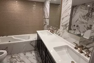 100 Cutter Mill Rd, Great Neck, NY 11021 - Photo 9