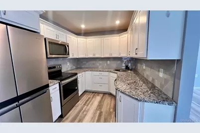 421 Weymouth Court #D, Ridge, NY 11961 - Photo 7