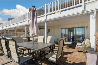 61 W Tiana Road #10, Hampton Bays, NY 11946 - Photo 1