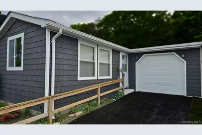 135 Village Circle W, Manorville, NY 11949 - Photo 1